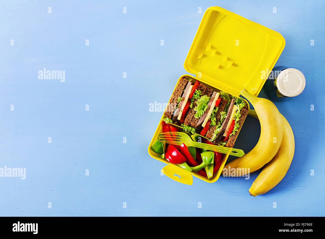 School breakfast apple fruit sandwich thermos flask. - Stock Image -  Everypixel