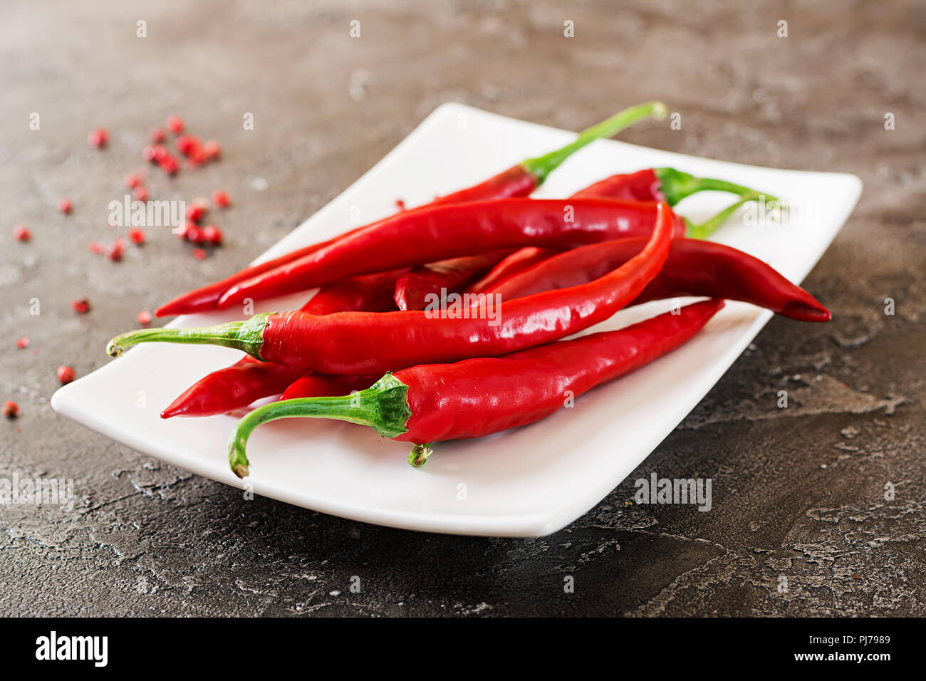 Plate spicy chili peppers hi-res stock photography and images - Alamy