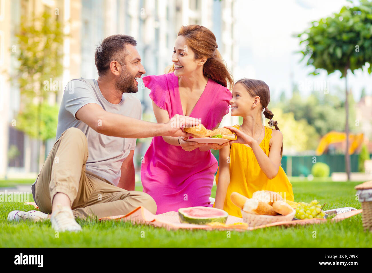 Joyful family hi-res stock photography and images - Alamy