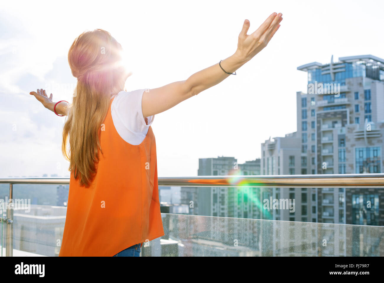 Person looking up into the sun hi-res stock photography and images - Alamy