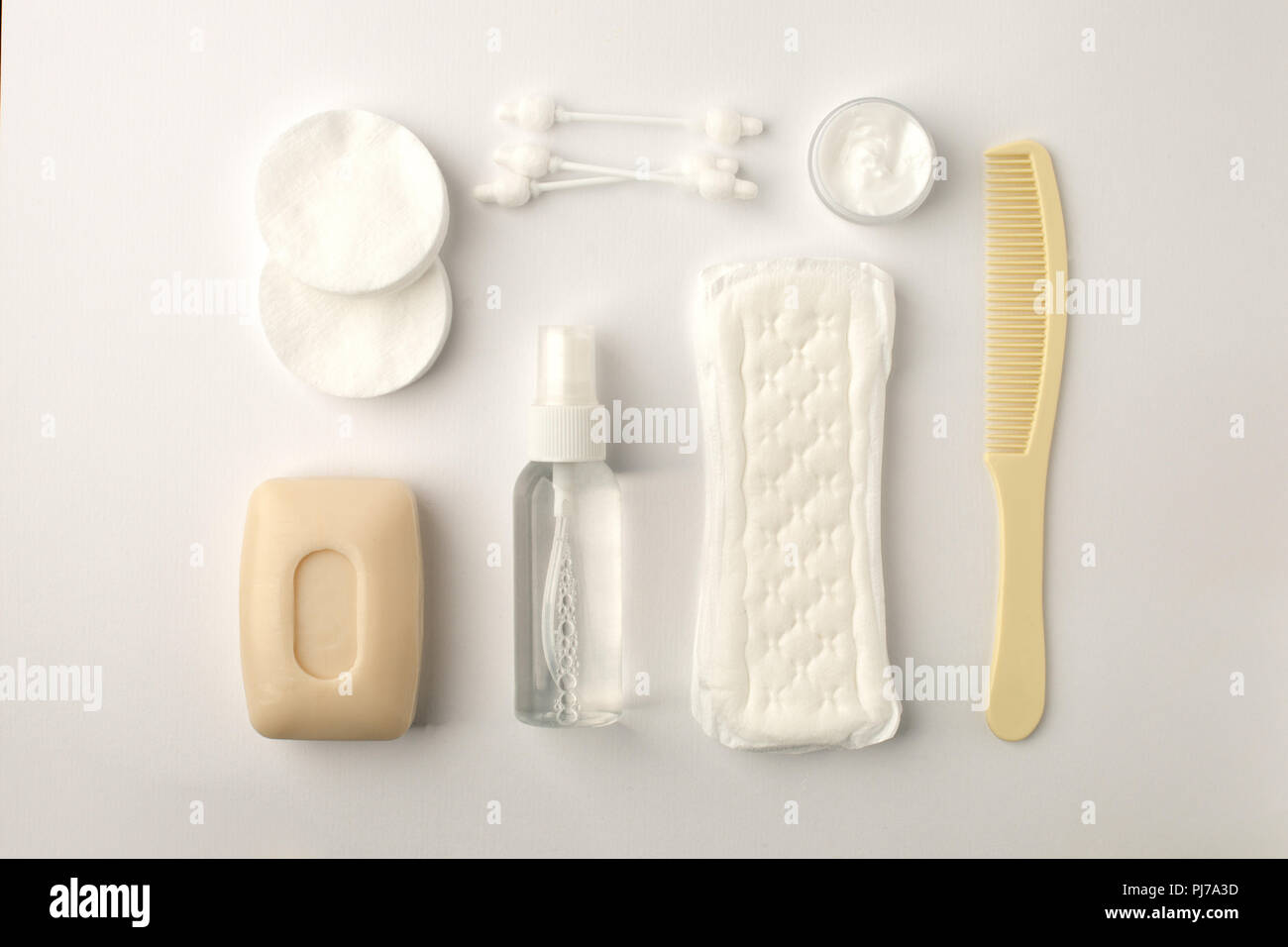 Different personal hygiene objects on white background, female boycare concept, monochrome, top