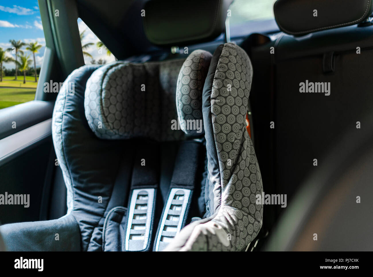 Child safety seat in the back of the car. Baby car seat for safety. Car