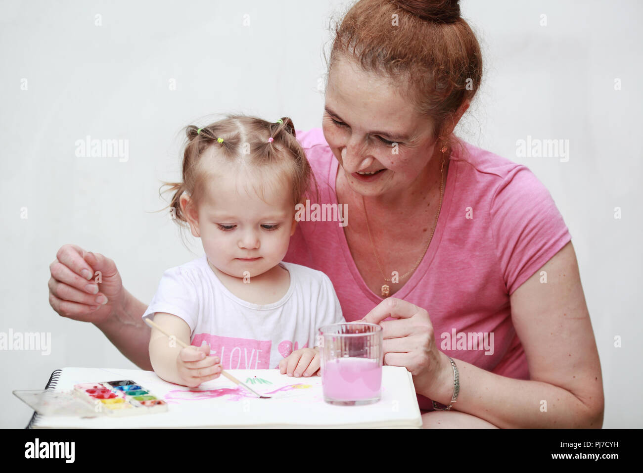 The girl is drawing Stock Photo