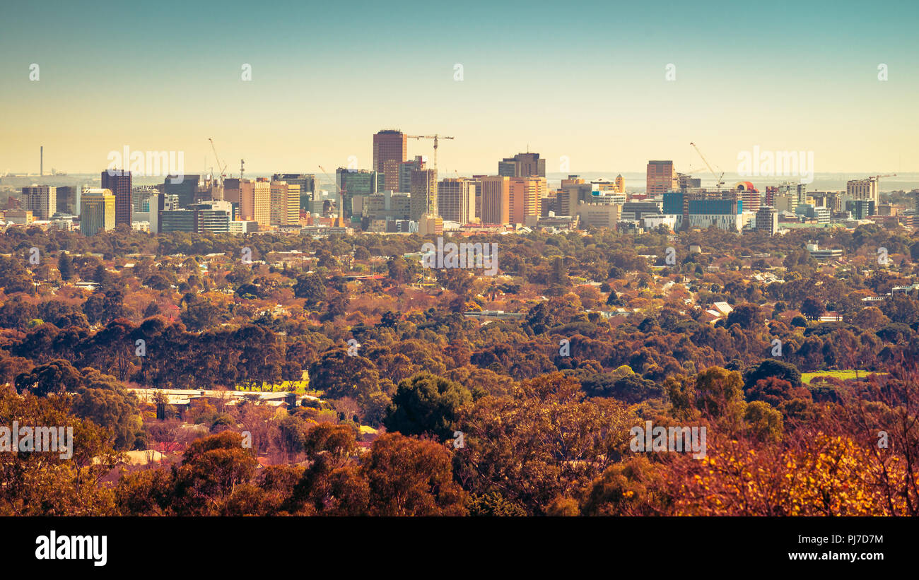 Adelaide city skyline at sunset viewed from the hills Stock Photo