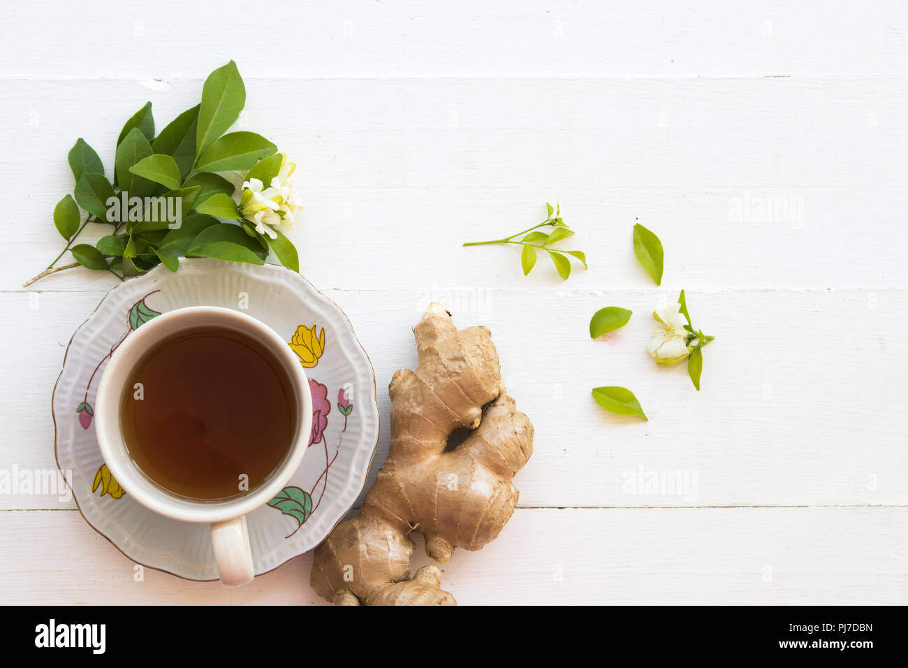 herbal health care hot ginger juice cough sore with flower on