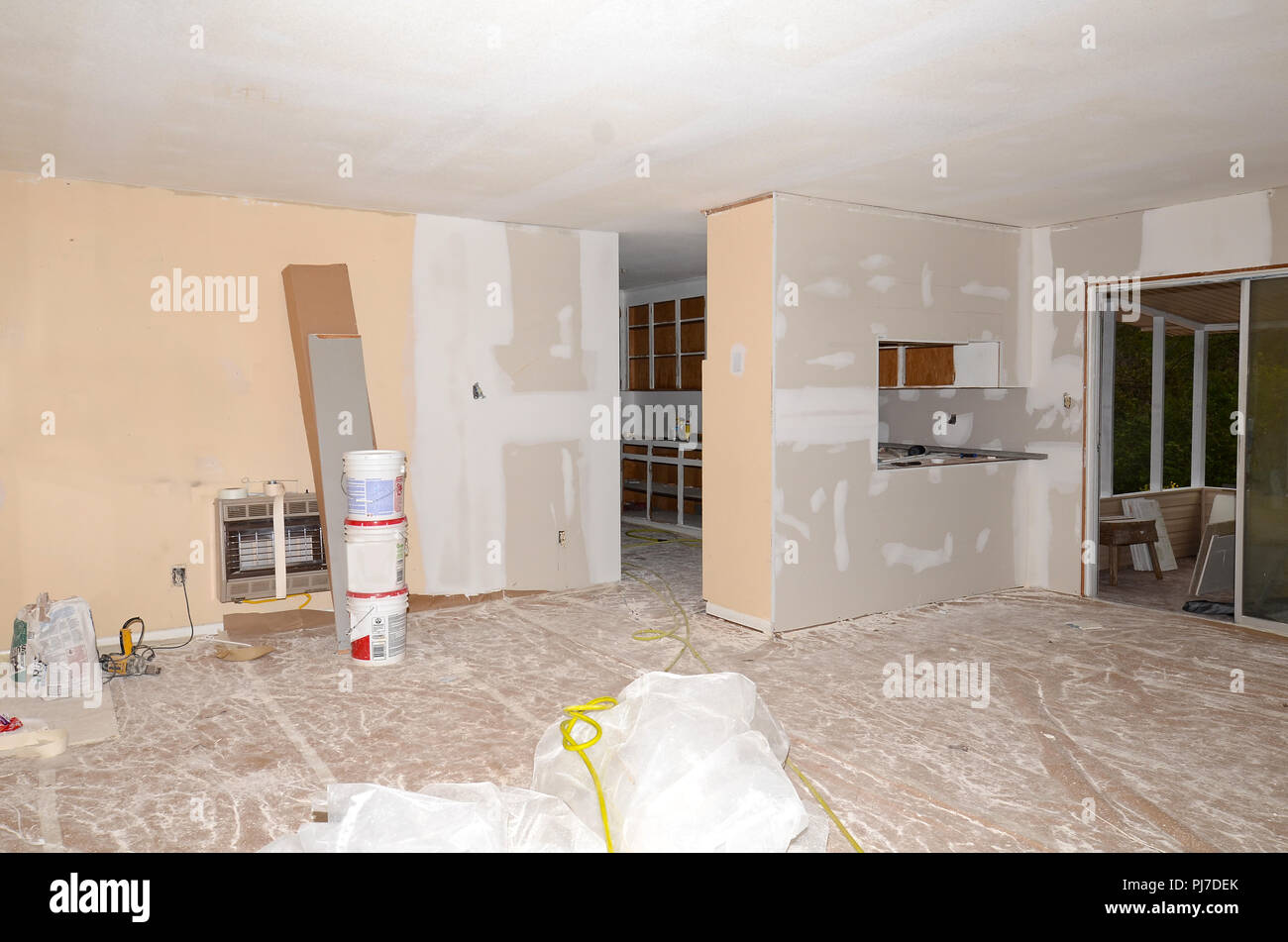 Interior of a house showing great room and kitchen areas being remodeled. Stock Photo