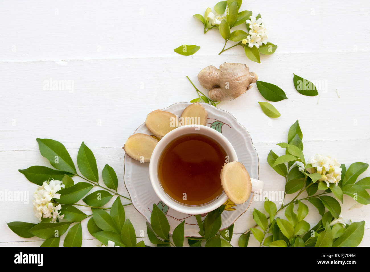 herbal health care hot ginger juice cough sore with flower on