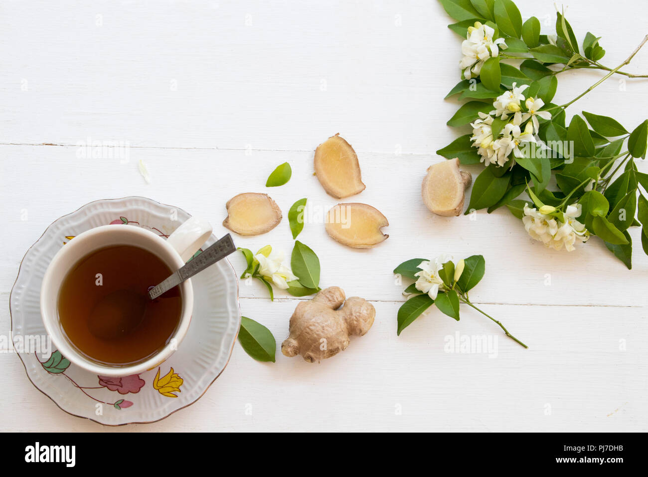 herbal health care hot ginger juice cough sore with flower on