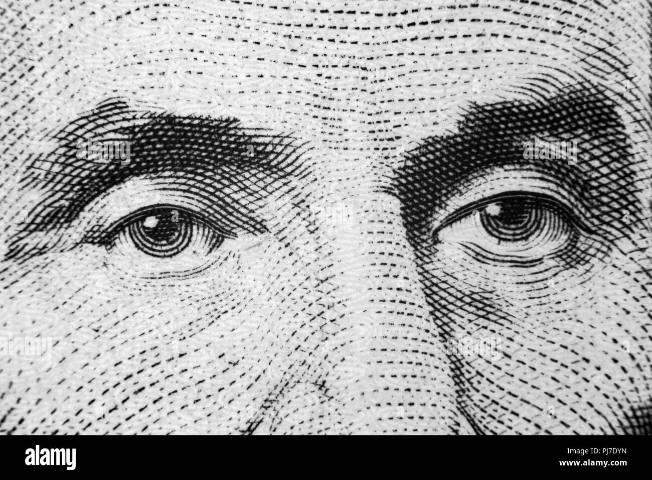 Close up view Portrait of Abraham Lincoln on the one five dollar bill. Background of the money. 5 dollar bill with Abraham Lincoln eyes macro shot. Mo Stock Photo