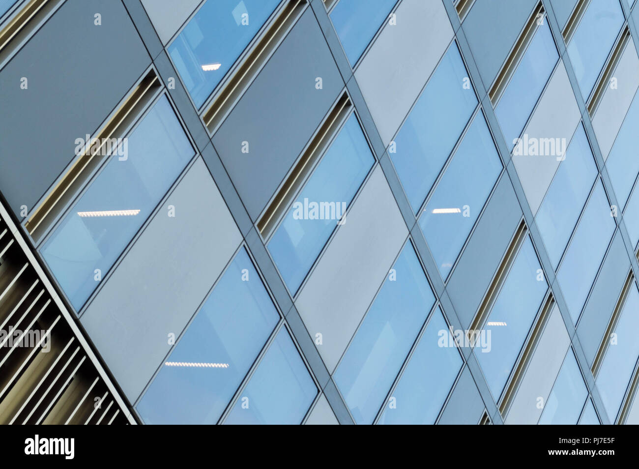 Business architecture building with glass windows and dynamic lines Stock Photo