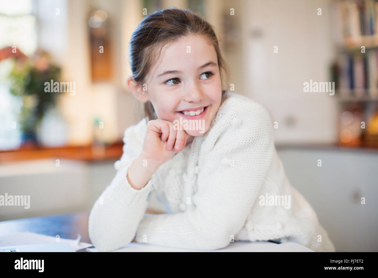 Portrait smiling, confident girl looking away Stock Photo