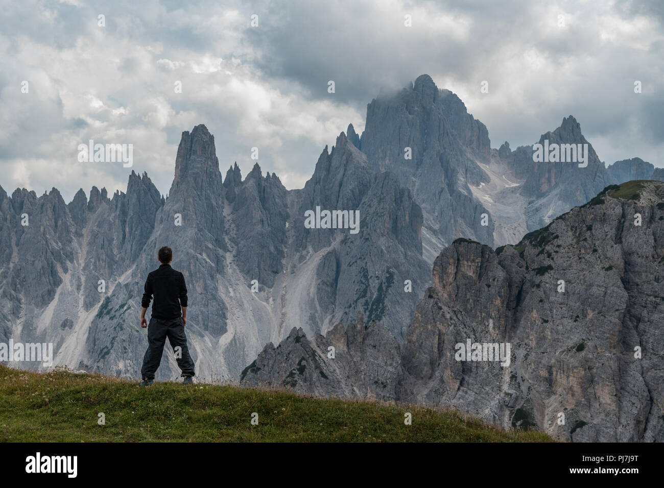 Hiking on Dolomites' most famous trail of Lavaredo Three Peaks Stock Photo