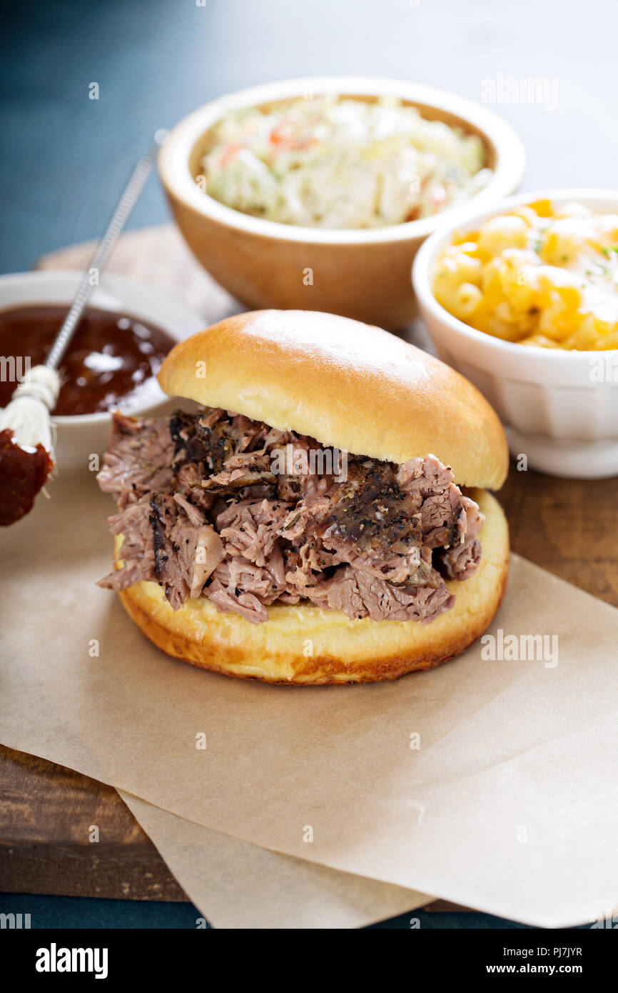 Bbq brisket sandwich with mac and cheese and cole slaw Stock Photo Alamy