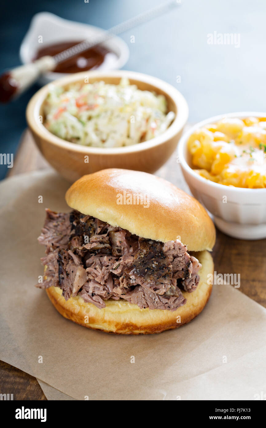 Bbq brisket sandwich with mac and cheese and cole slaw Stock Photo Alamy