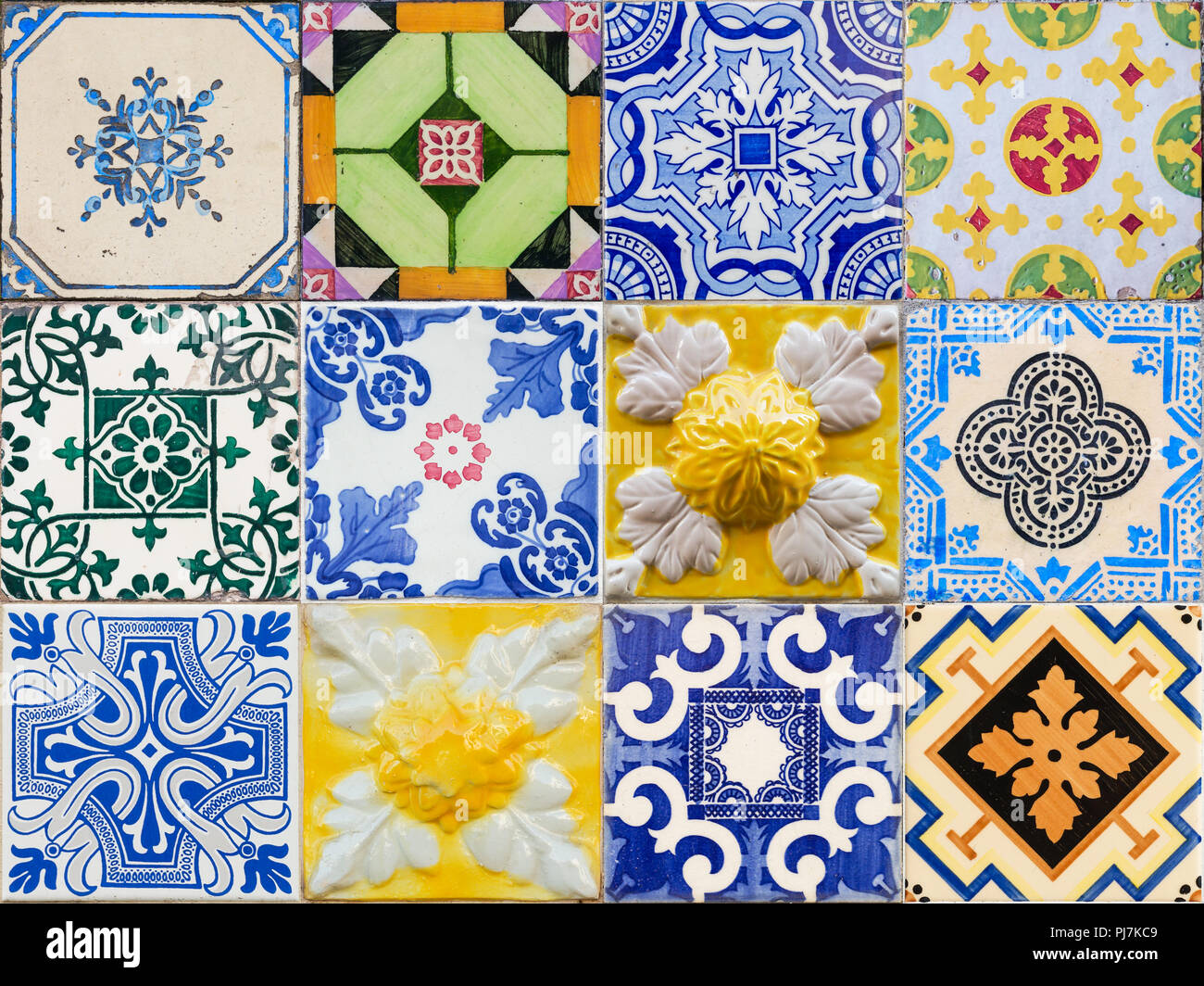 Mixed colage of the traditional portuguese azulejo tiles on the buildings in Porto, Portugal. Colorful background texture. Stock Photo