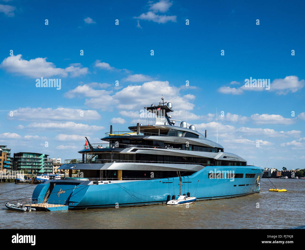 Aviva III Joe Lewis 98m SuperYacht moored on the River Thames in central London - Aviva Yacht was completed by Abeking & Rasmussen in 2017 Stock Photo