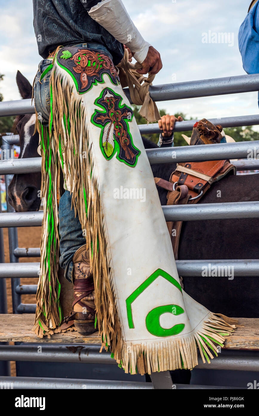 Cowboy in western chaps. Texas rodeo USA. Stock Photo