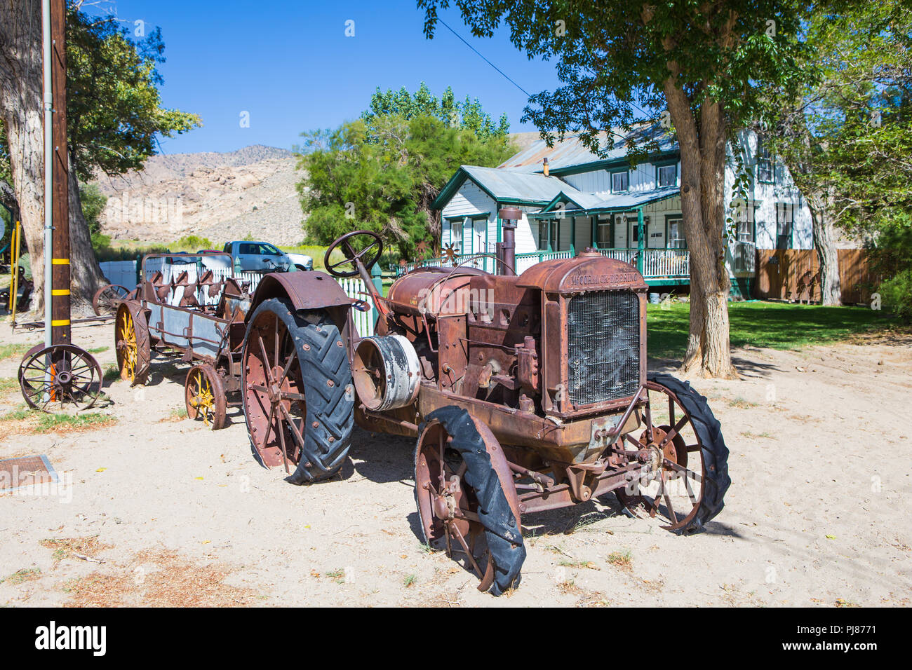 Old Mccormick-Derring tractor. The trademark name of a line farm machinery manufactured by the International Harvester Company. Benton hot springs Ca Stock Photo