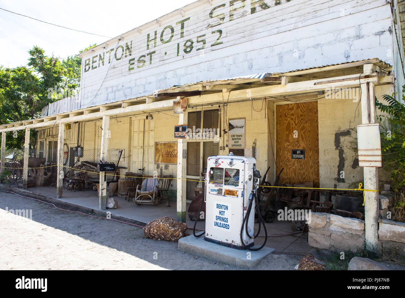 Old gas pump outside a general store and Former Wells Fargo Agency building on highway 120 in Benton Hot springs California USA Stock Photo