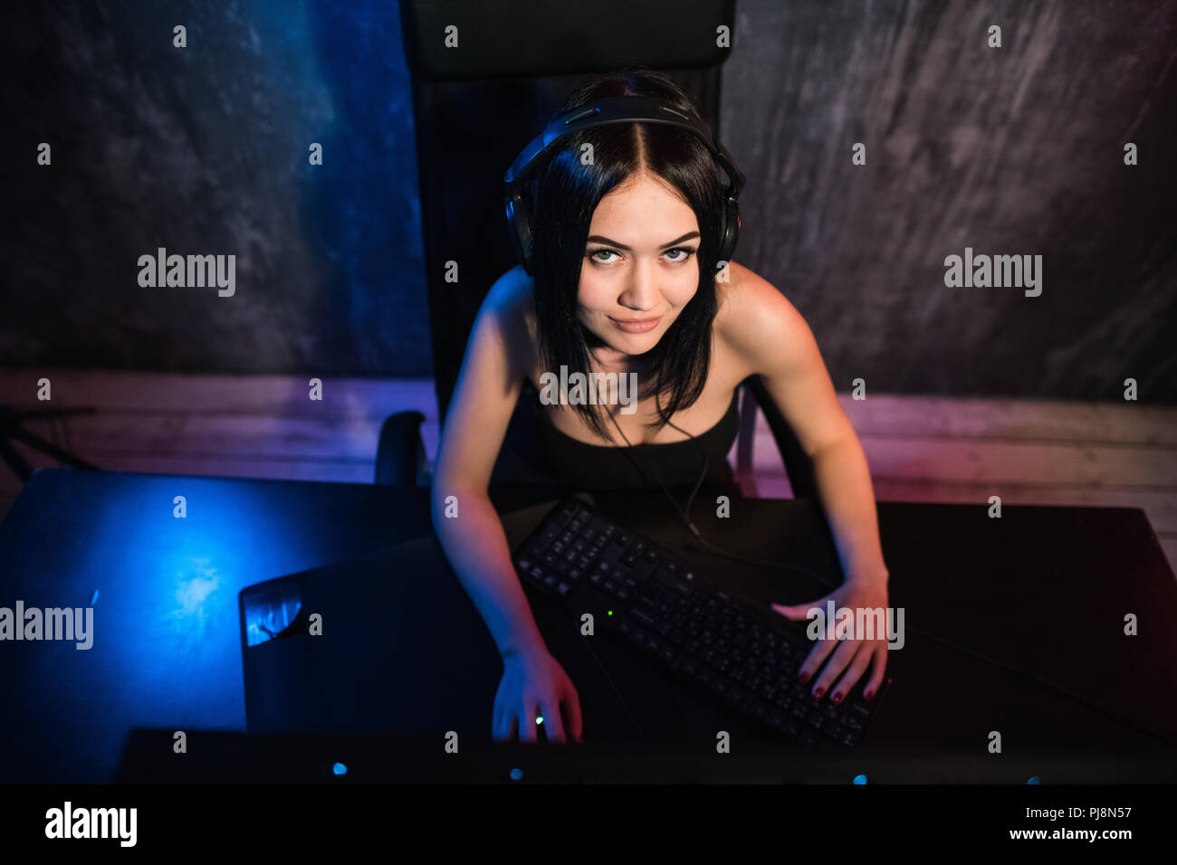 Gamer Girl Seating in Front of the Computer Playing Online Game, People  Stock Footage ft. adult & athome - Envato Elements