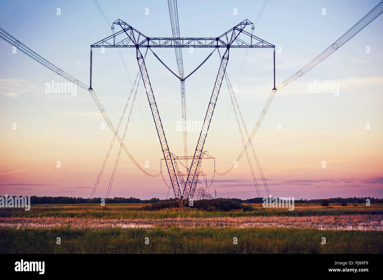Silhouette High voltage electric tower on sunset time and sky on sunset ...