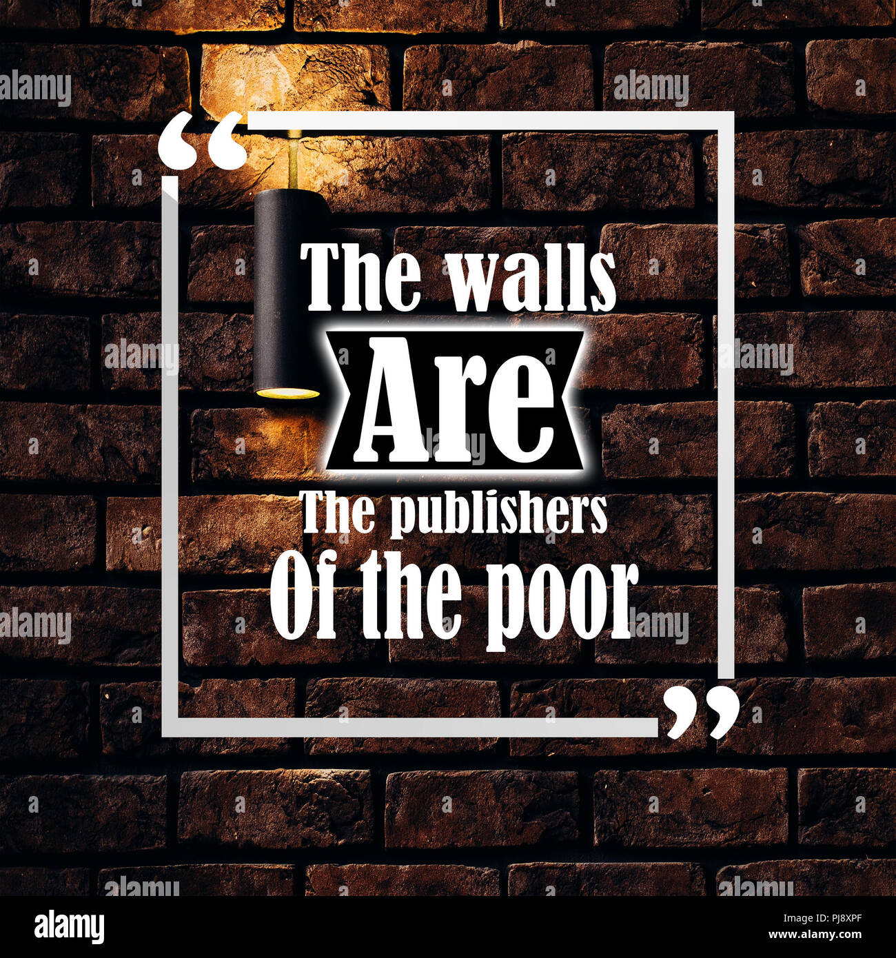 Inspirational Quotes: The walls are the publishers of the poor, positive, motivation, inspiration Stock Photo