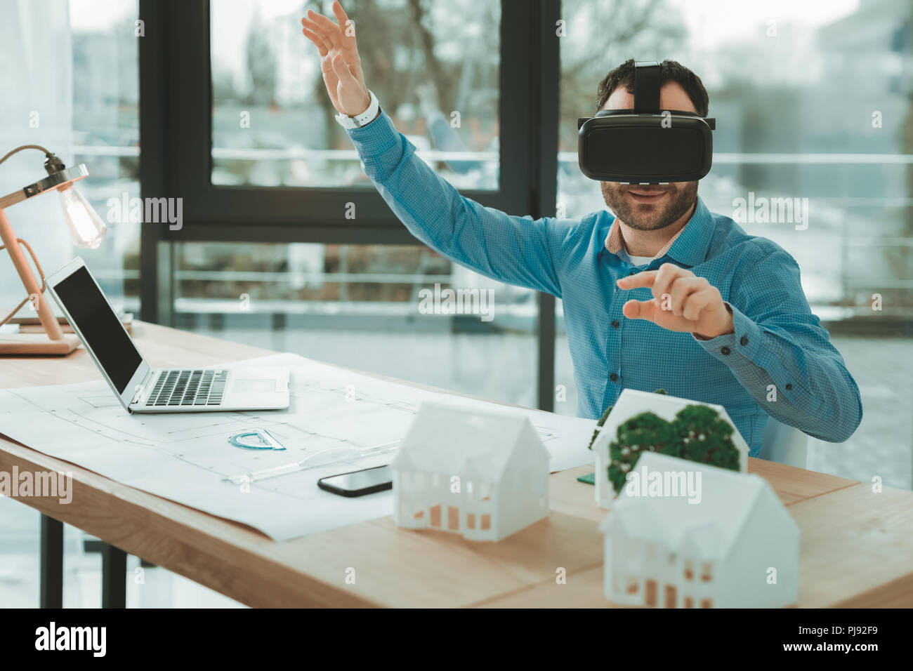 Delighted nice man using 3d glasses Stock Photo
