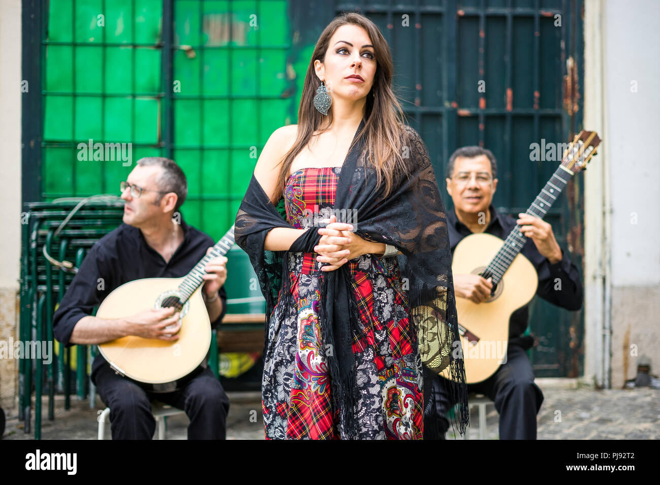 Fado band performing traditional portuguese music on the square of