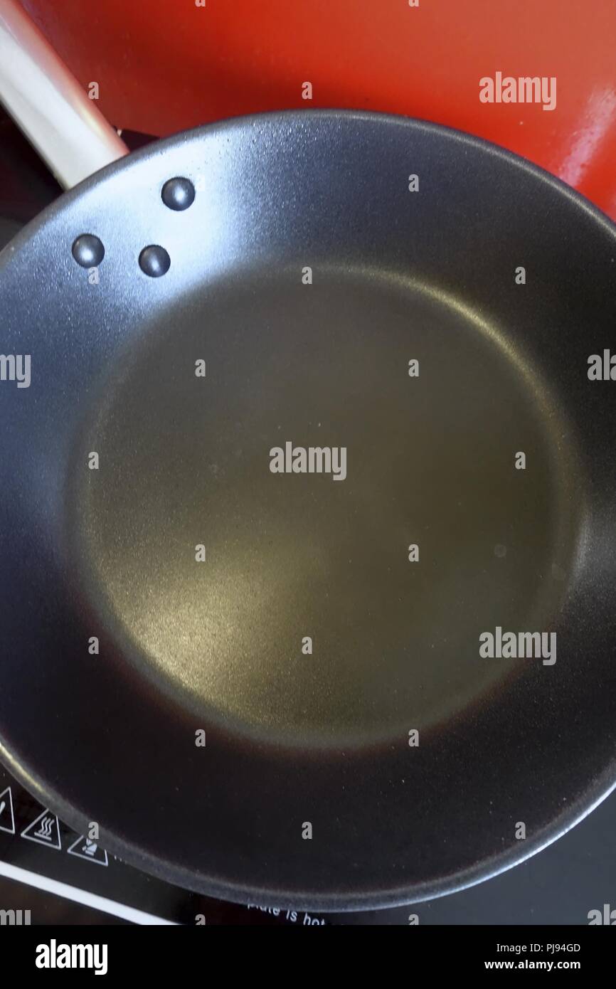 Empty Frying Pan on a Induction Hob Stock Photo Alamy