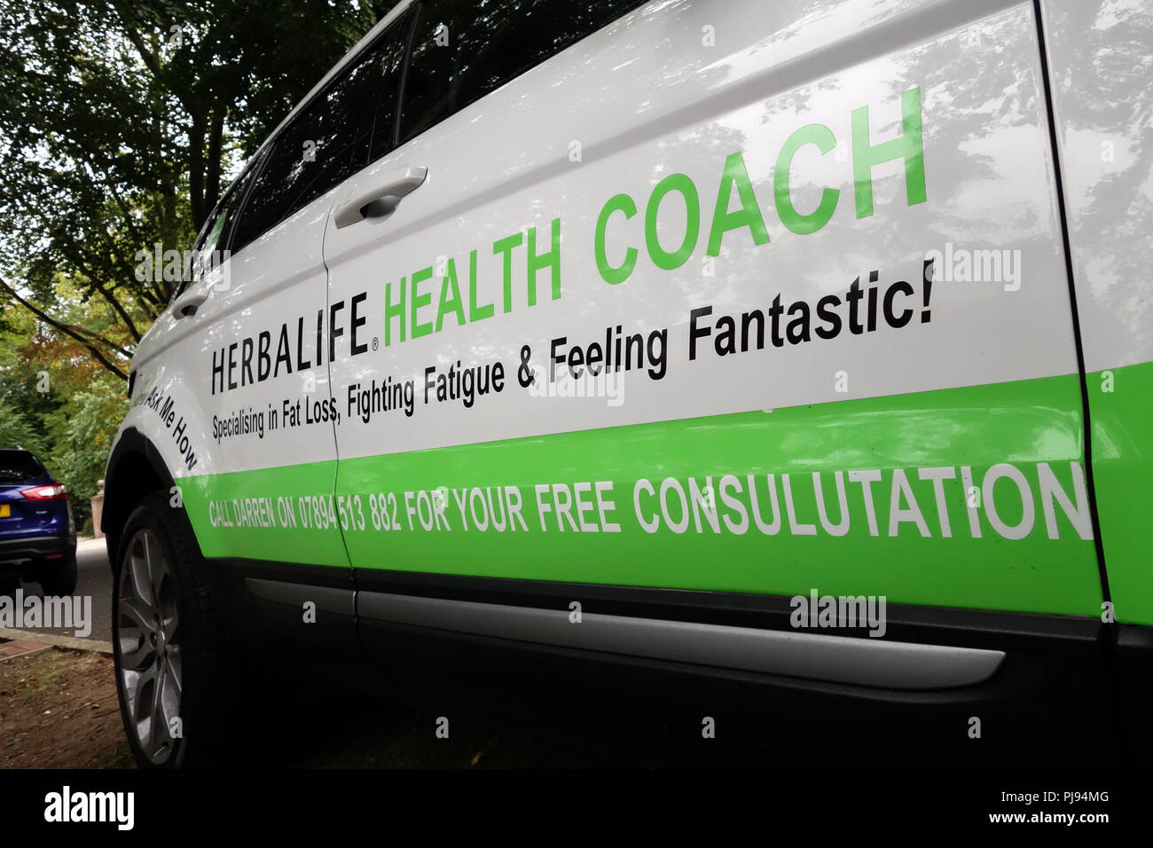 Herbalife Health Coach Range Rover Evoque Sign written car from a low ...