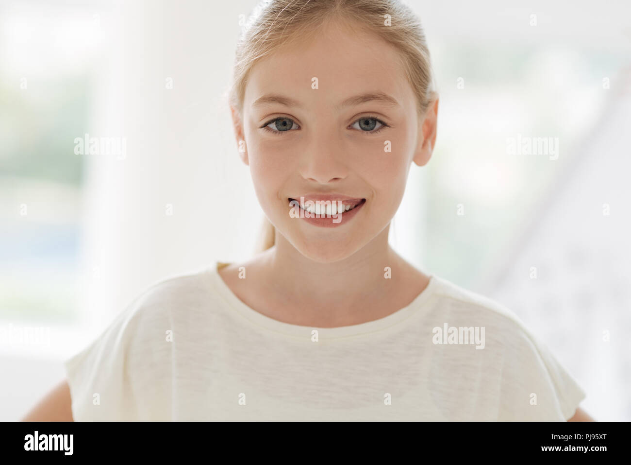 Portrait of pretty girl that smiling on camera Stock Photo - Alamy