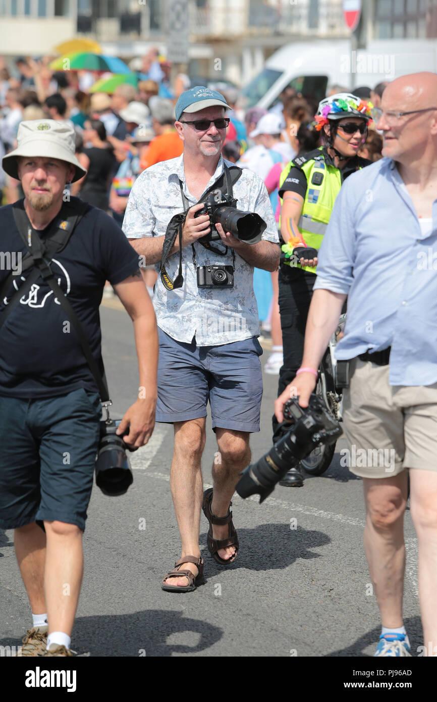 Freelance photographer Simon Dack working the streets of Brighton and Hove. Stock Photo