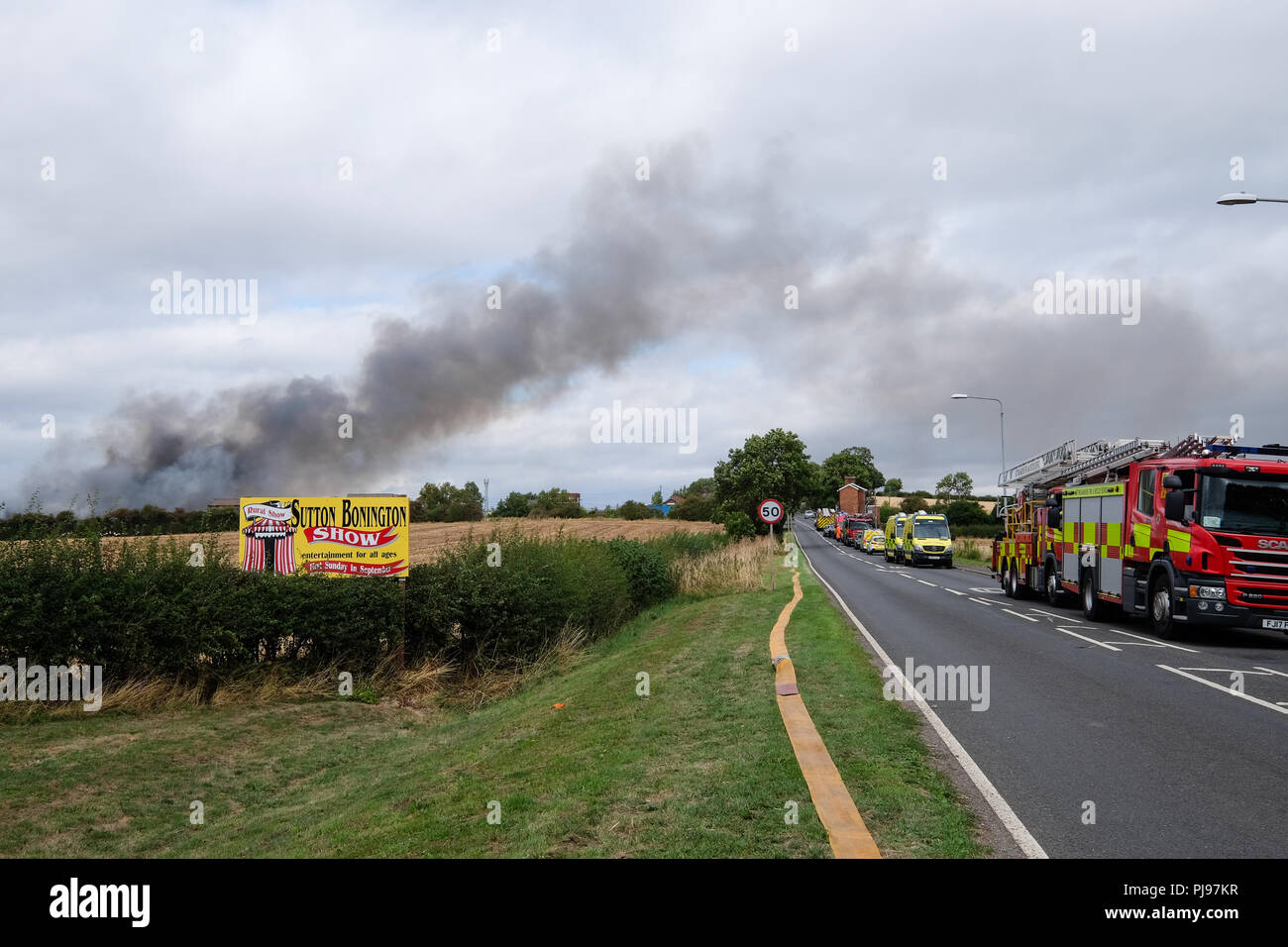 emergency services at the scene of a large fire Stock Photo