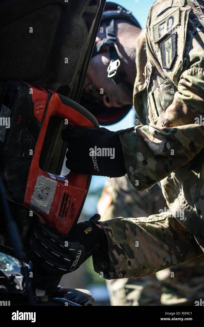 A Soldier from the 287th Engineer Detachment, trains at the The New York City Fire Department Academy, New York City, New York, on July 9, 2018.  New York City Fire Department (FDNY) with U.S. Army North, and U.S. Northern Command (NORTHCOM) conducts training as a joint exercise simulating Chemical, Biological, Radiological, and Nuclear (CBRN) events to maximize the appropriate  response from first responders. Stock Photo