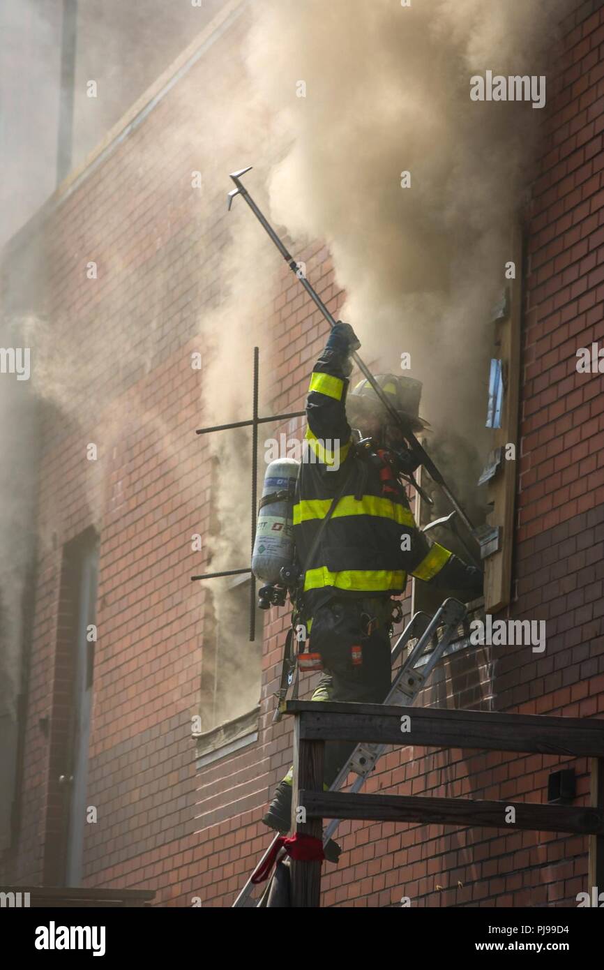 Fire Rescue At A Window New Bedford Fire Department Deals With