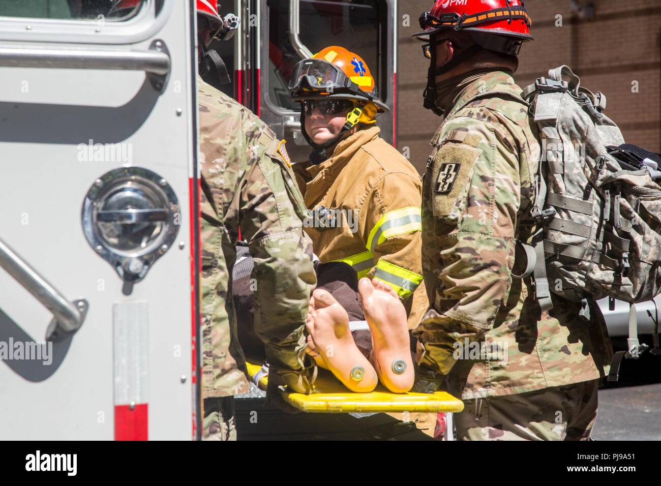 Firefighters with the New York City Fire Department (FDNY) train ...