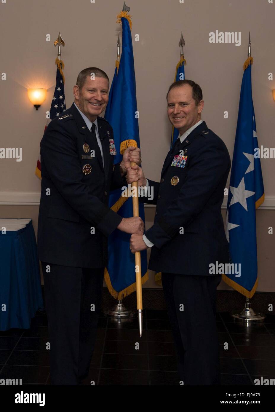 Brig. Gen. Eric H. Froehlich, Air Force Global Strike Command logistics, engineering and force protection director, promotes from the rank of Colonel to Brigadier General by Gen. Robin Rand, AFGSC commander, at Barksdale Air Force Base, La., July 6, 2018. Stock Photo