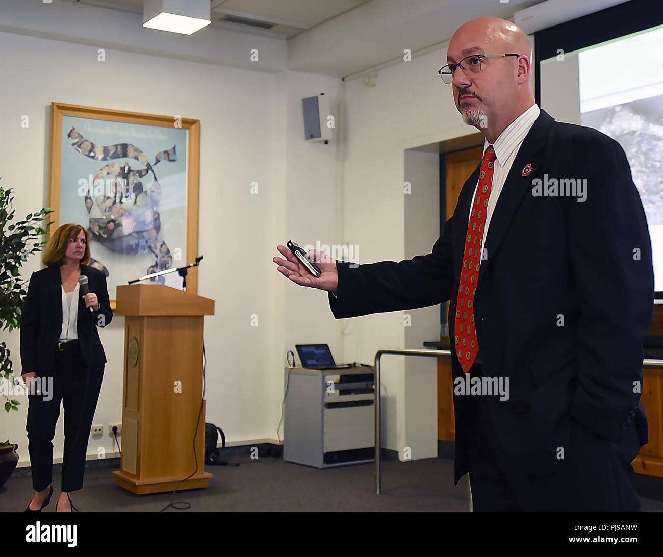 GARMISCH-PARTENKIRCHEN, Germany (July 13, 2018) – Special Agents Tom and Jean O’Connor, both with the U.S. Federal Bureau of Investigation’s Joint Terrorism Task Force in Washington D.C., talk about evidence and prosecution to 68 security professionals from 44 countries attending the Program on Terrorism and Security Studies at the George C. Marshall European Center for Security Studies July 9. Stock Photo