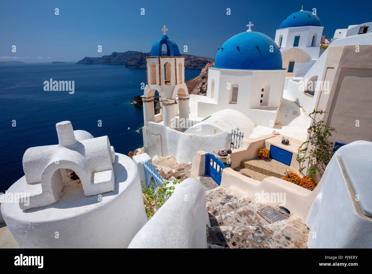 Oia, Santorini. Image of famous cyclades village Oia located at the island of Santorini, South Aegean, Greece. Stock Photo