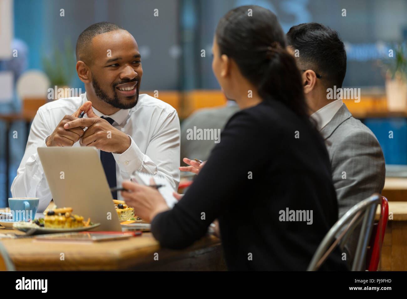 Business people meeting, working in cafe Stock Photo