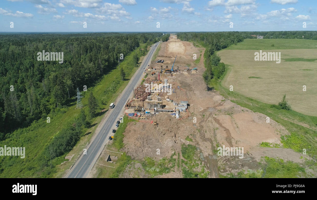 Construction of toll roads in rural areas. Aerial view construction of