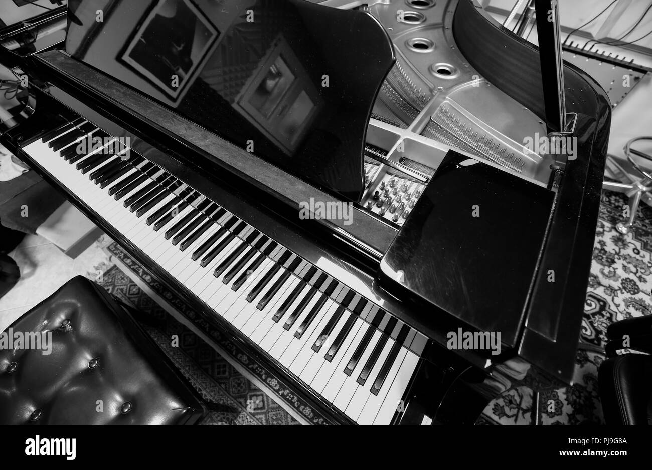 An elegant piano used for classical music concerts Stock Photo - Alamy