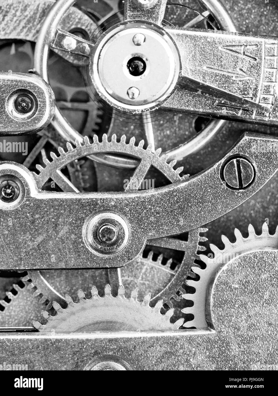 antique pocket watch movement close up in black and white style Stock