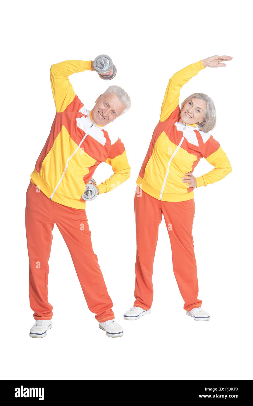 Portrait of active smiling senior couple doing exercise Stock Photo - Alamy