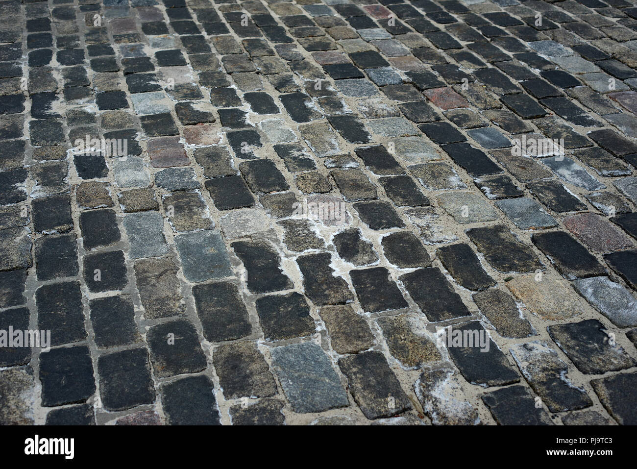 old cobblestone road for background or texture Stock Photo - Alamy