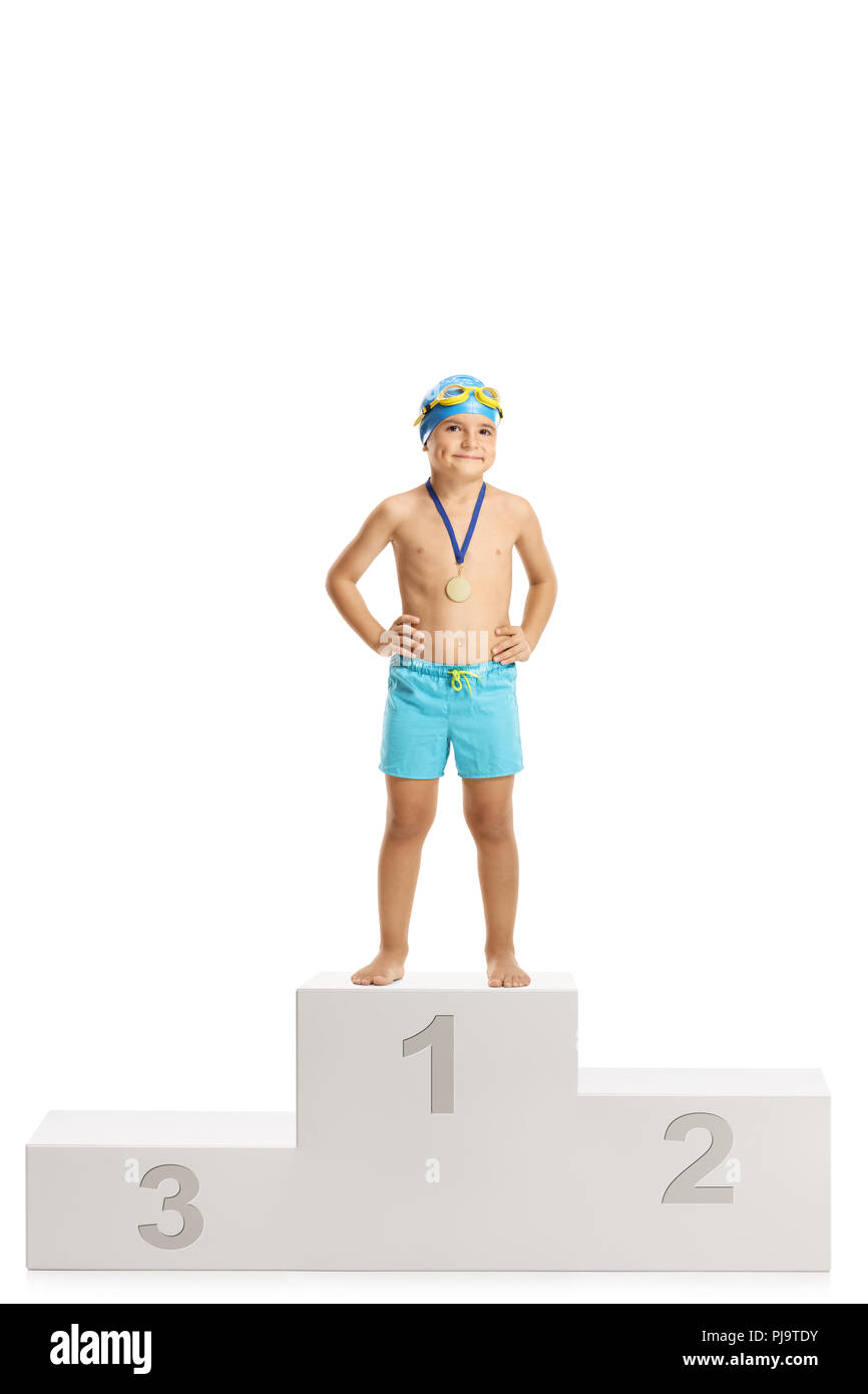 Cute boy swimmer on a winner's podium isolated on white background Stock Photo