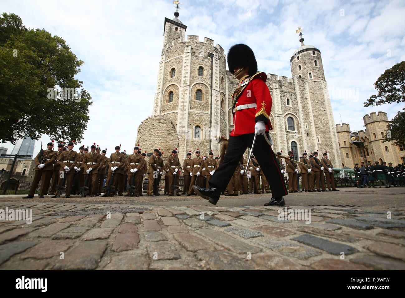Members of the Royal Regiment of Fusiliers wait to set of from the Tower of London on a parade through the city of London to celebrate 50 years since their regiment was formed. Stock Photo