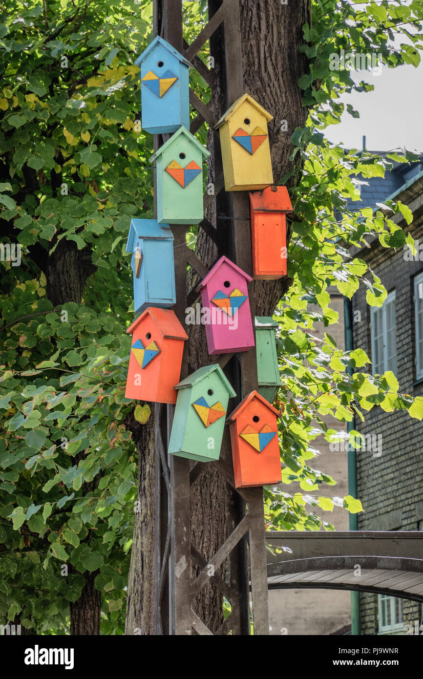 Nesting boxes hanging on  a lightpole Stock Photo