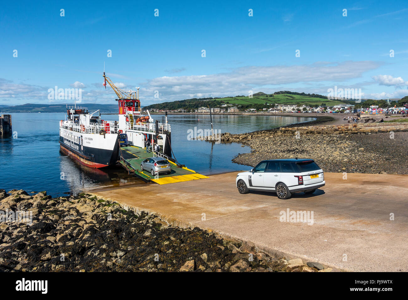 Cars amd passengers boarding the Loch Riddon car and passenger ferry at