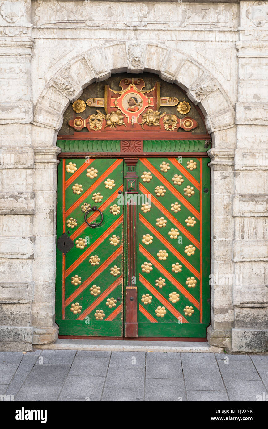 View of the medieval door at the entrance to the Brotherhood Of The Blackheads Guild House in Pikk Street, Tallinn, Estonia. Stock Photo